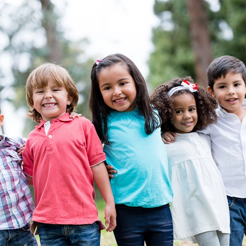 Group of young children smiling