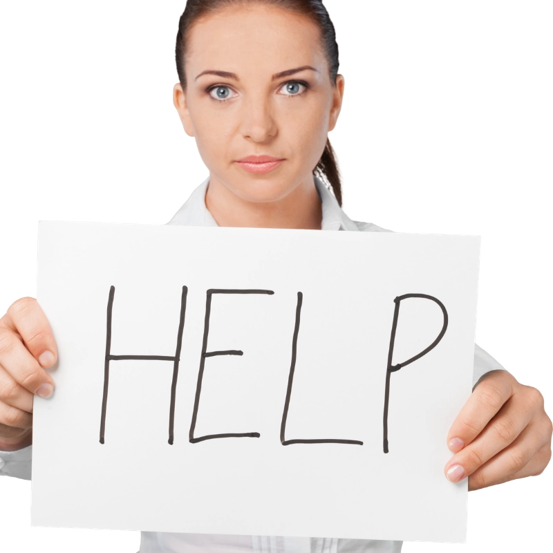 Woman holding paper with the word "Help" writted on it