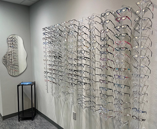 Wall of display glasses frames